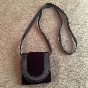 Cute black, velvet crossbody dress purse. Approx 4 1/2” x 5”. Strap approx 25”